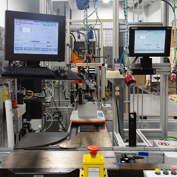 Image of a manufacturing test station machine with two sigPODs