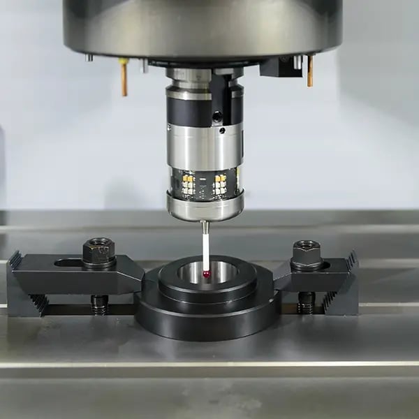 A laser probe measuring the internal diameter of a part on a manufacturing line