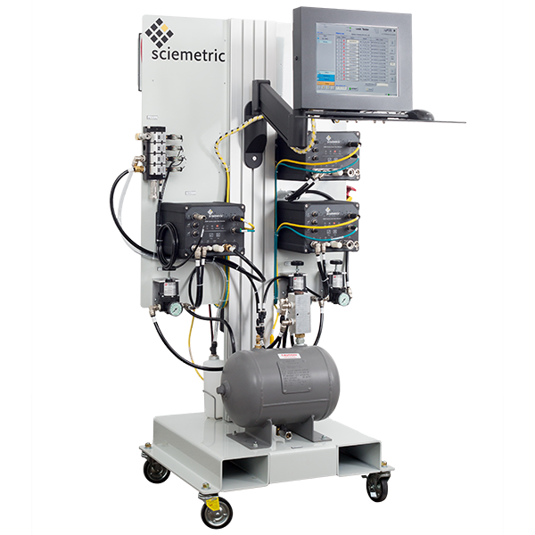 Leak test machine with two leak test instruments, air tank and control on a stand with wheels