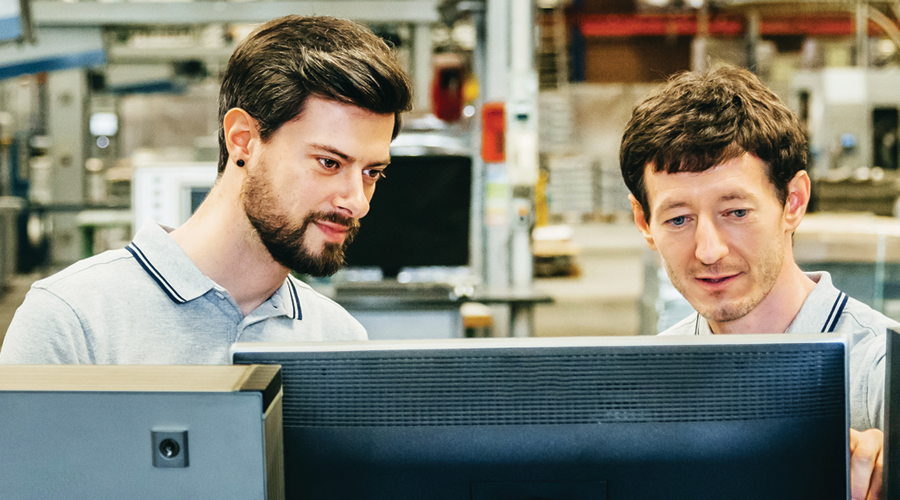 two men on computer 