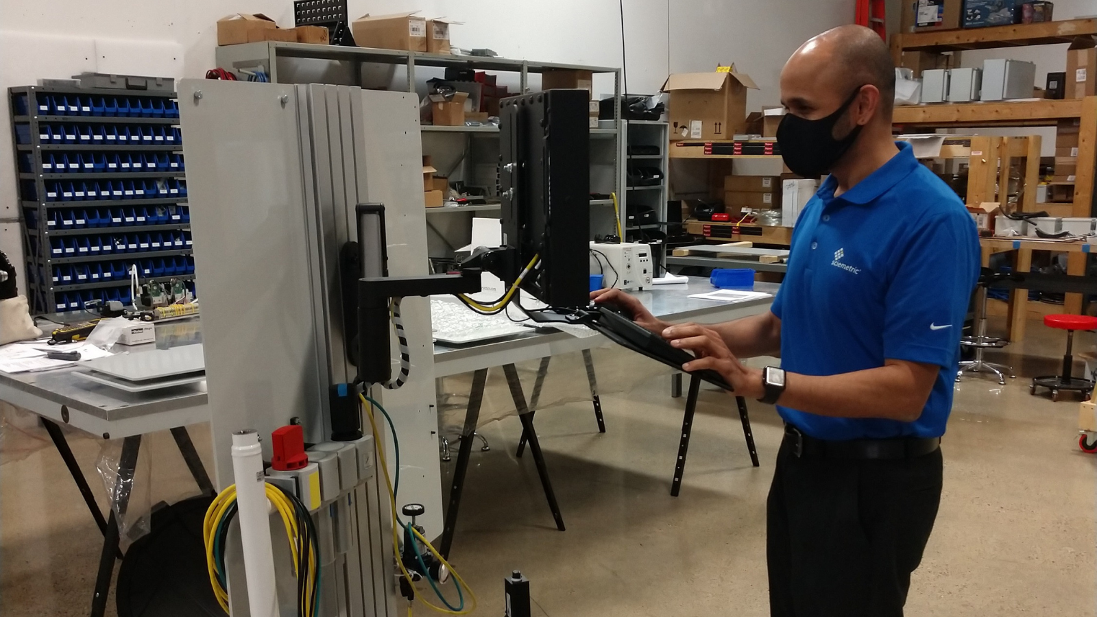 Shankar, author, looking at data on the plant floor