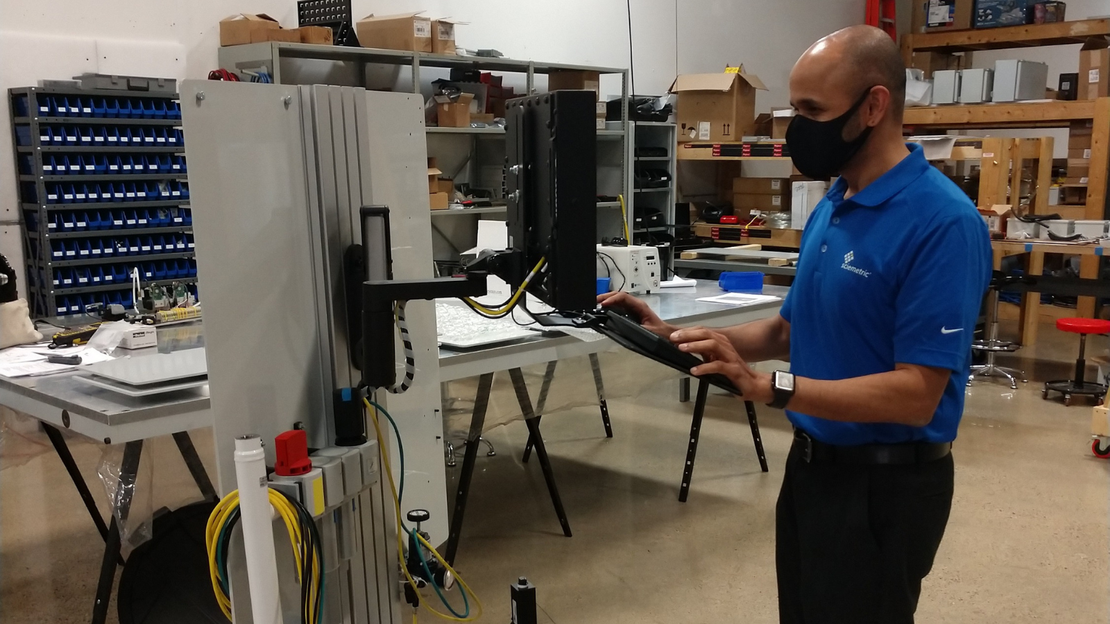 Shankar, author, looking at data on the plant floor 