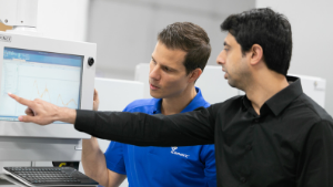 engineers working on screen